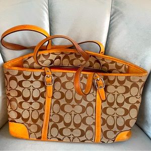 Classic COACH bag great for spring. Small sized bucket bag with some wear.